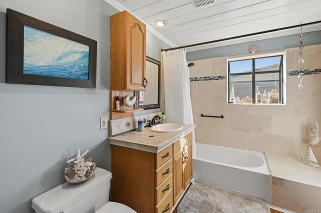 a bedroom with a bed and furniture