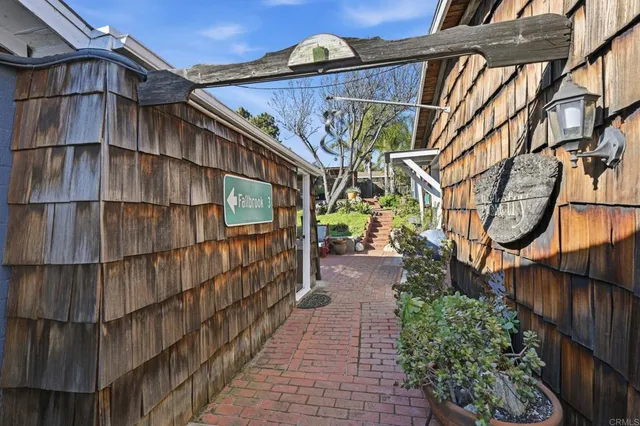 a potted plants sitting in front of a house