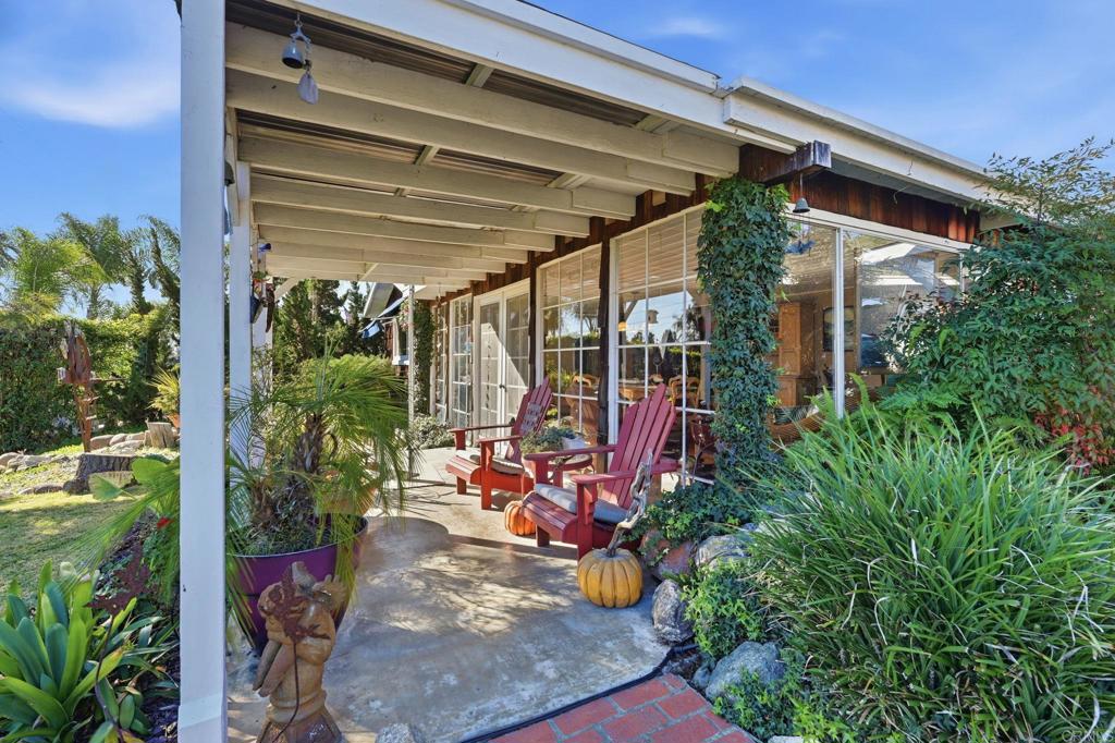 145 Barhaven Lane Fallbrook, CA 92028 - Photo 4 of 46 a view of a living room with a patio
