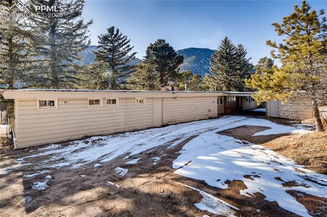 7720 Marriott Road Cascade, CO 80809 - Photo 2 of 28 View of house from the street