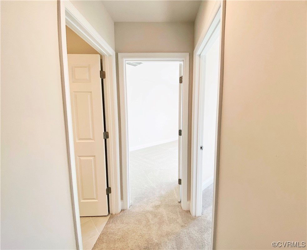 7001 Dunton Road Chesterfield, VA 23832 - Photo 22 of 28 a view of a bathroom from a hallway