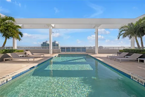 a view of a terrace with a swimming pool