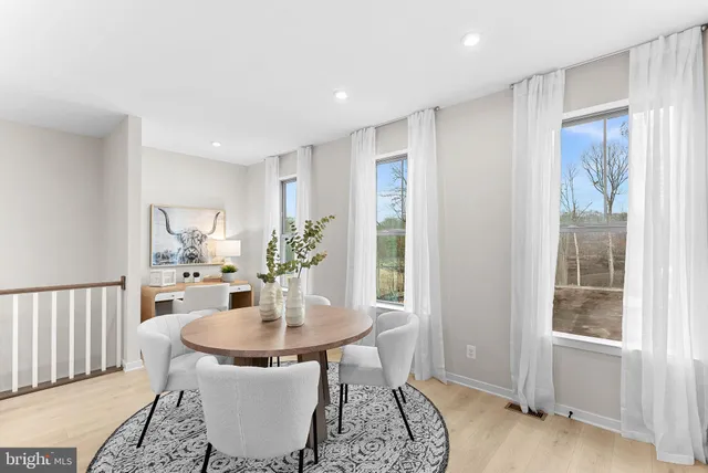 a kitchen with a sink and refrigerator
