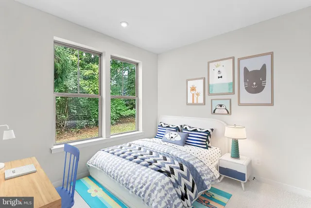 a bathroom with a granite countertop sink a toilet a mirror a vanity and shower