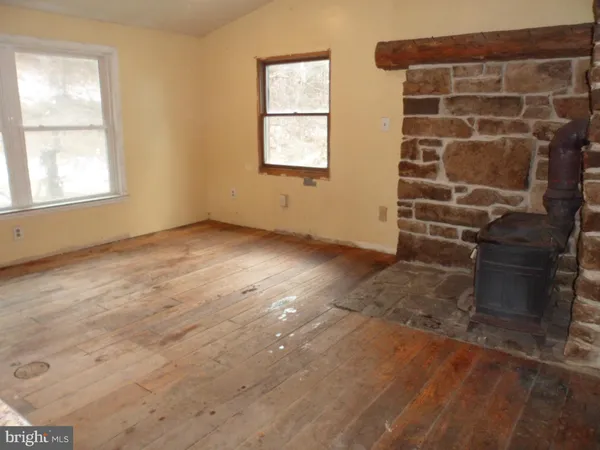 an empty room with windows
