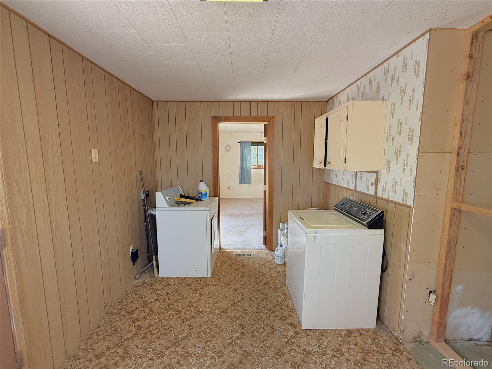 426 3rd Street Hugo, CO 80821 - Photo 13 of 34 a room with a washer and dryer