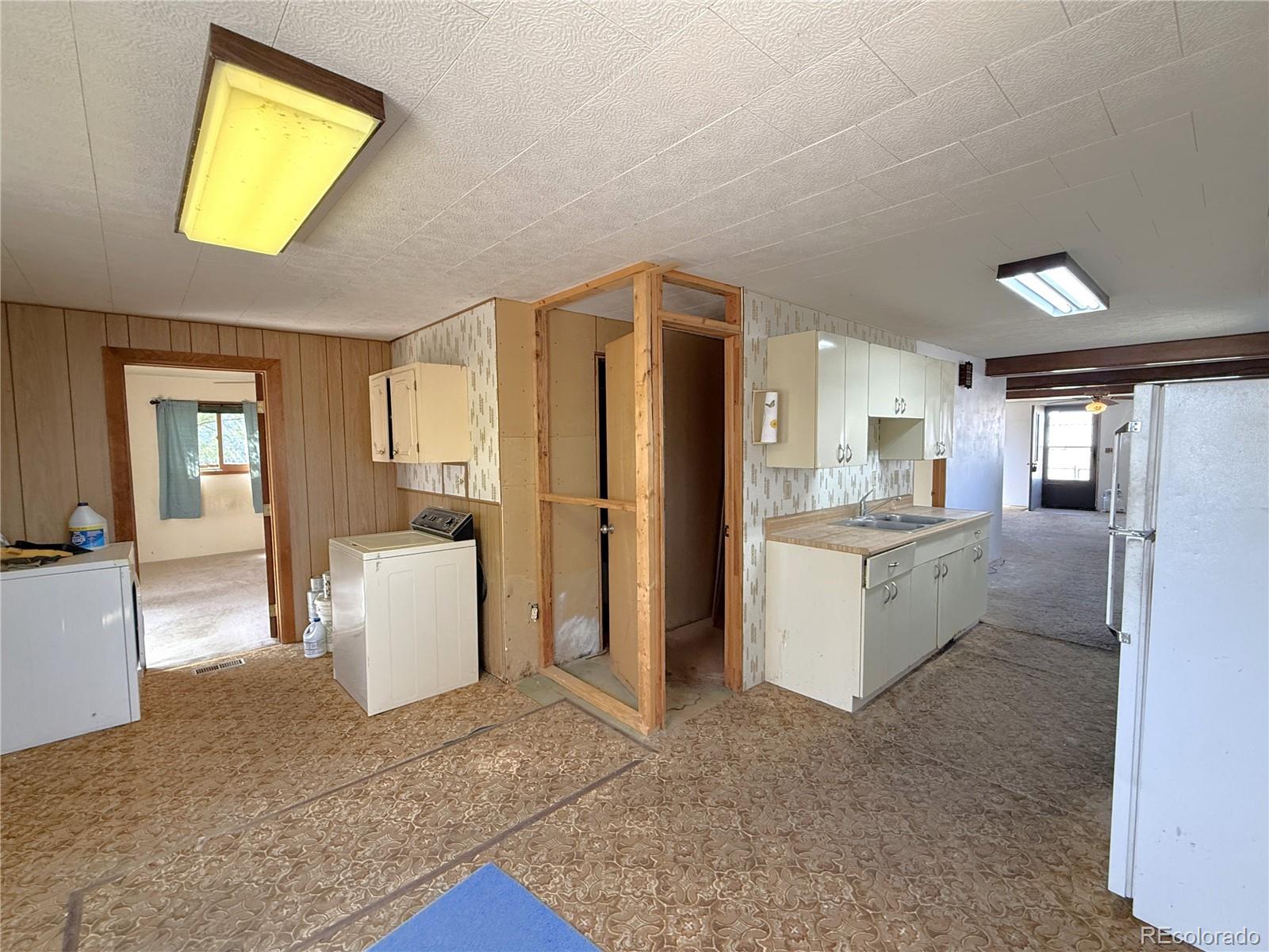 426 3rd Street Hugo, CO 80821 - Photo 14 of 34 a view of a kitchen and a window