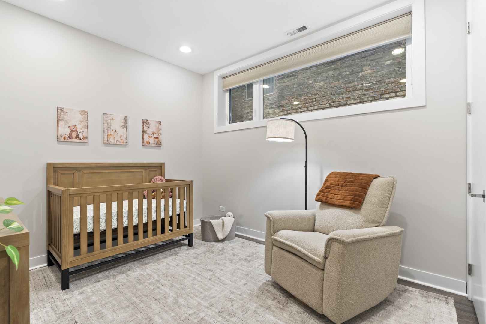 878 North Marshfield Avenue, Unit 1 Chicago, IL 60622 - Photo 19 of 26 a bedroom with a couch and a window