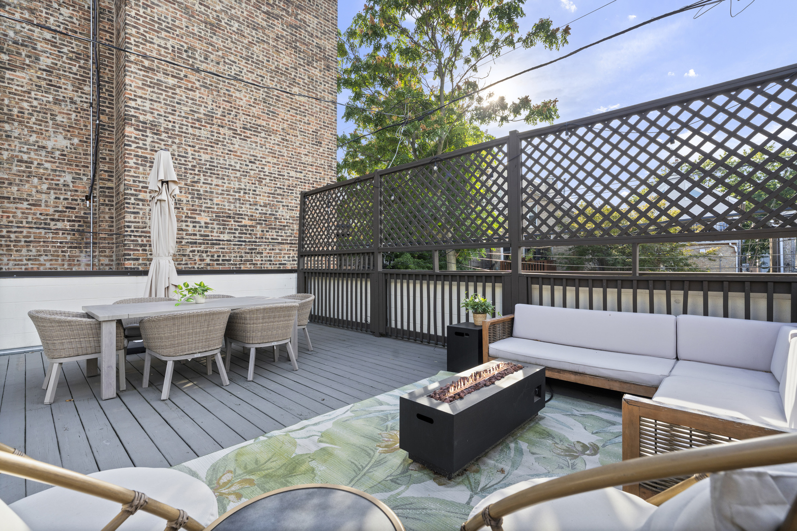 878 North Marshfield Avenue, Unit 1 Chicago, IL 60622 - Photo 24 of 26 a view of a patio with couches table and chairs