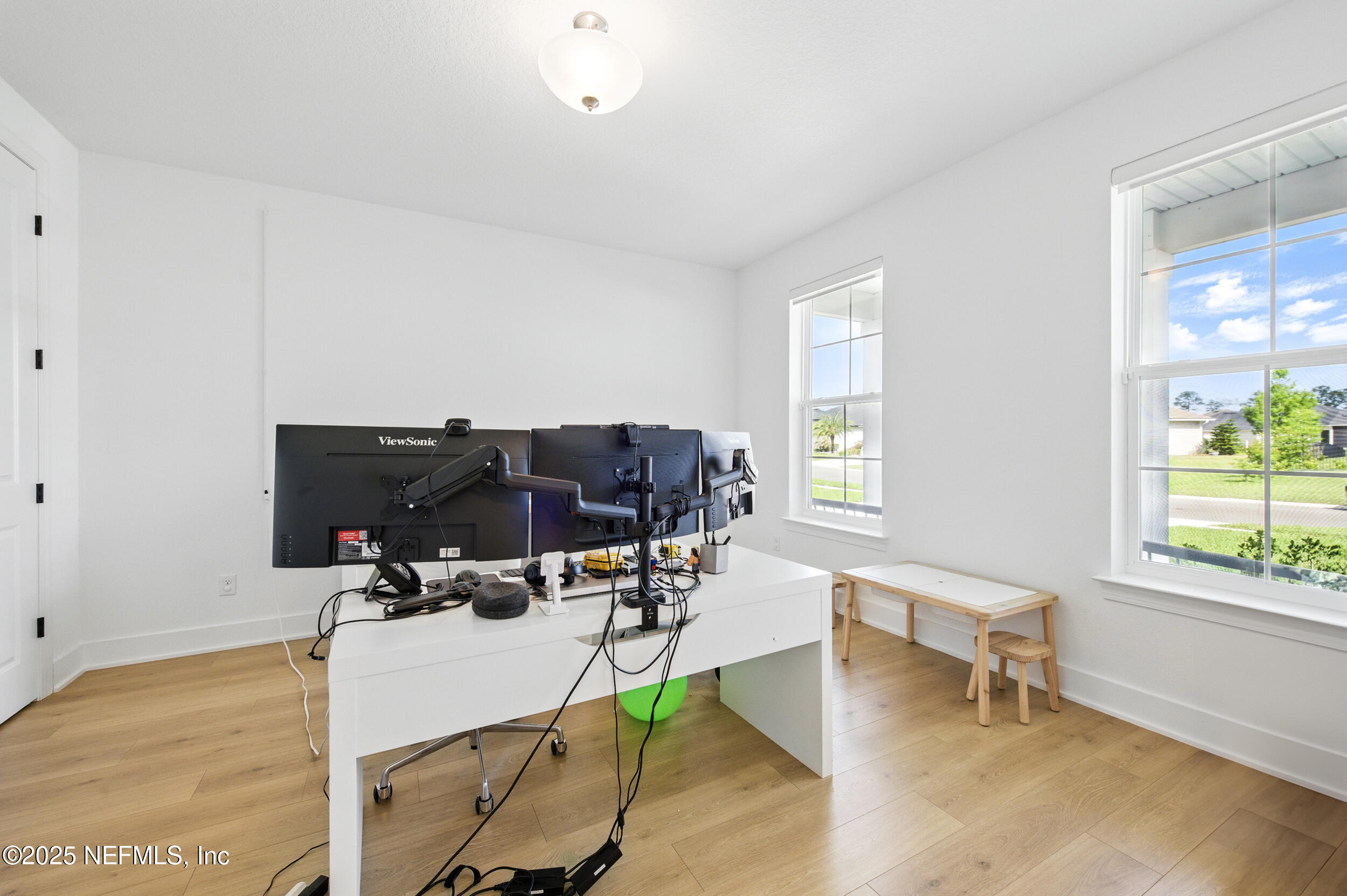 177 Windwalker Drive St. Augustine, FL 32092 - Photo 15 of 30 a view of a workspace with furniture and a window