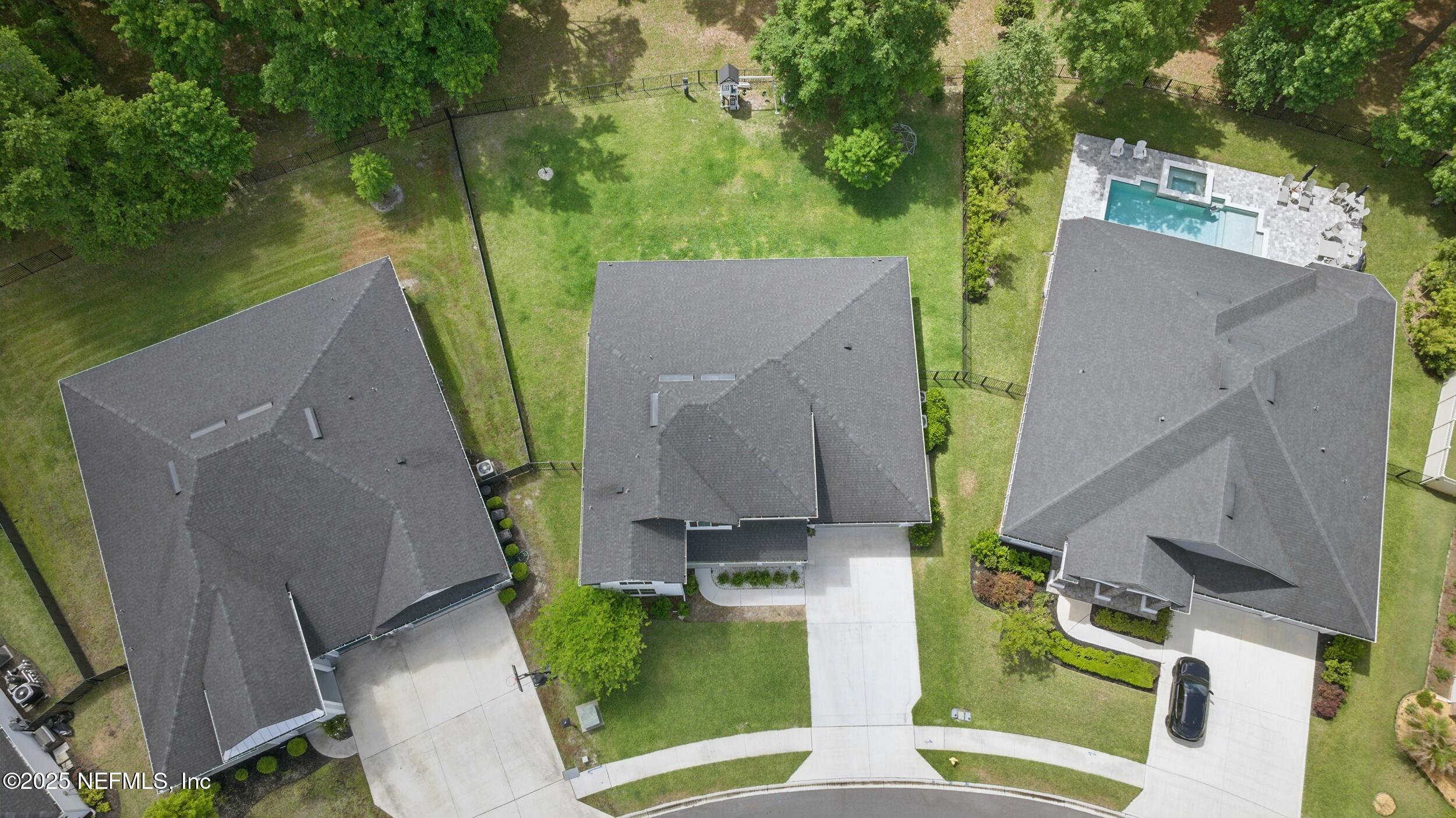 177 Windwalker Drive St. Augustine, FL 32092 - Photo 29 of 30 an aerial view of a house with outdoor space and a lake view