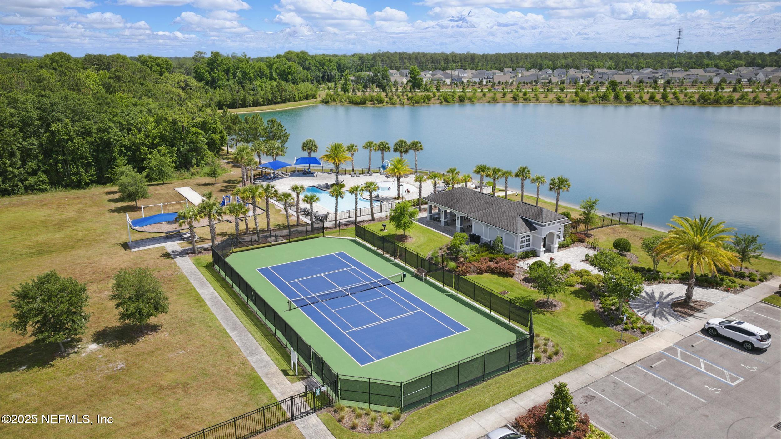 177 Windwalker Drive St. Augustine, FL 32092 - Photo 30 of 30 a view of a chairs and table on the terrace