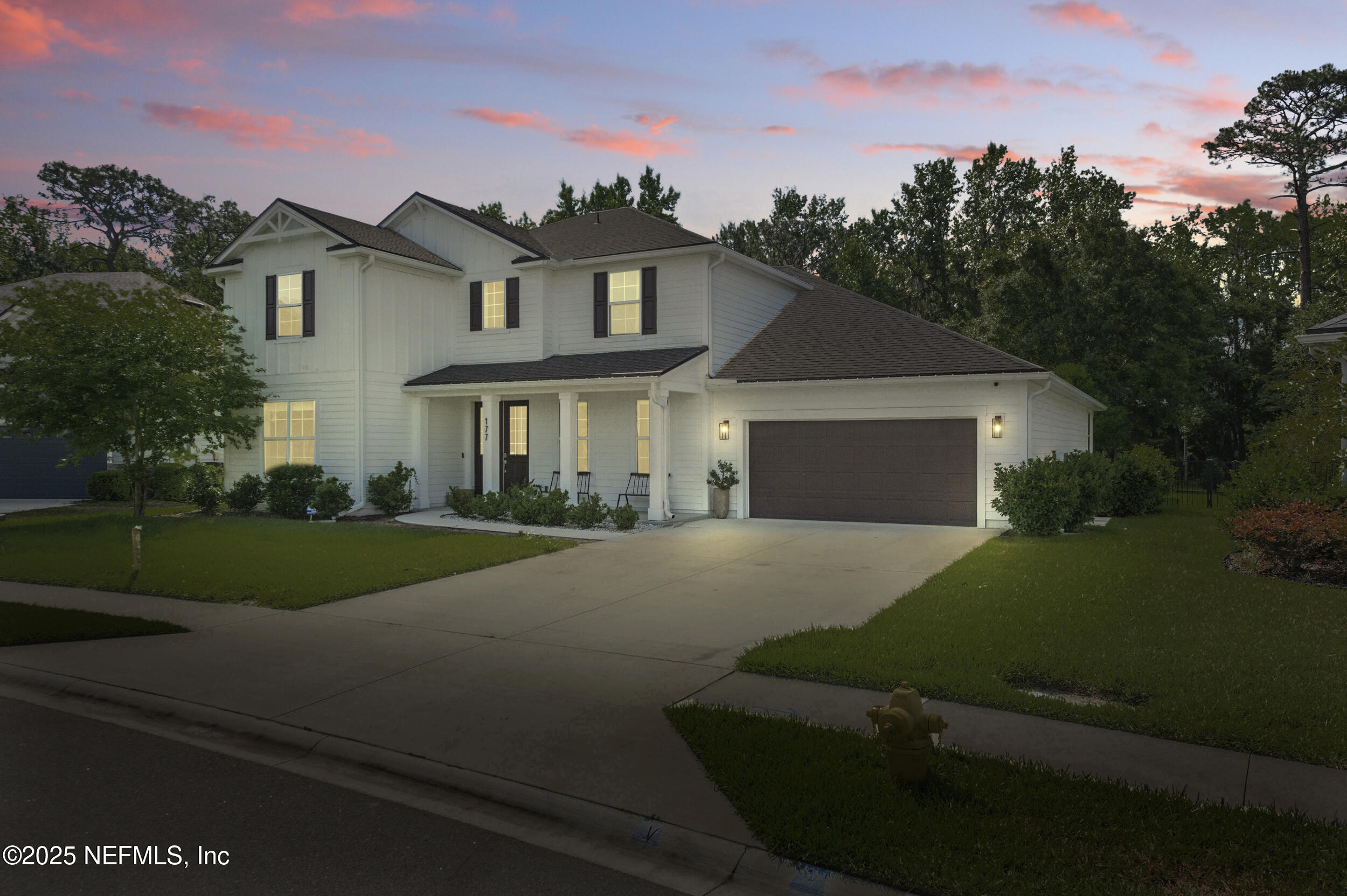 177 Windwalker Drive St. Augustine, FL 32092 - Photo 4 of 30 front view of a house with a garden