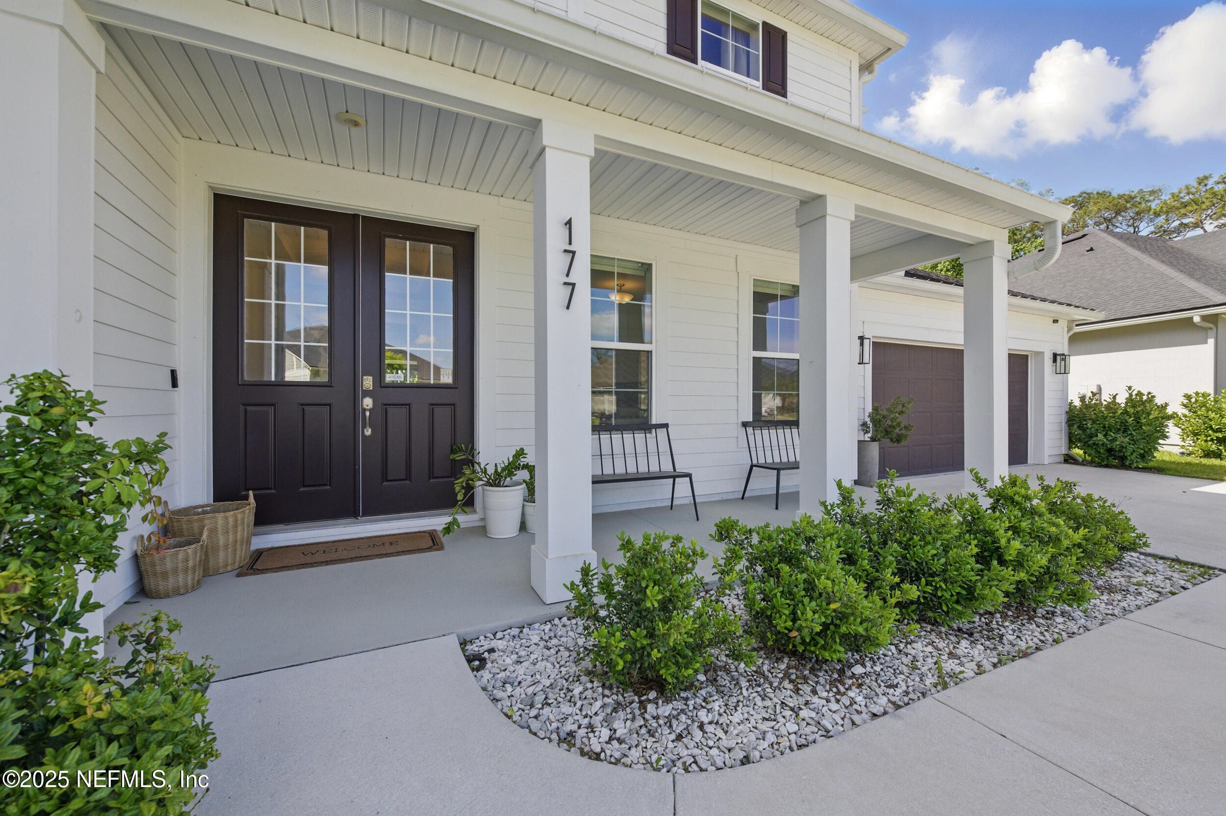 177 Windwalker Drive St. Augustine, FL 32092 - Photo 5 of 30 a front view of a house with a yard