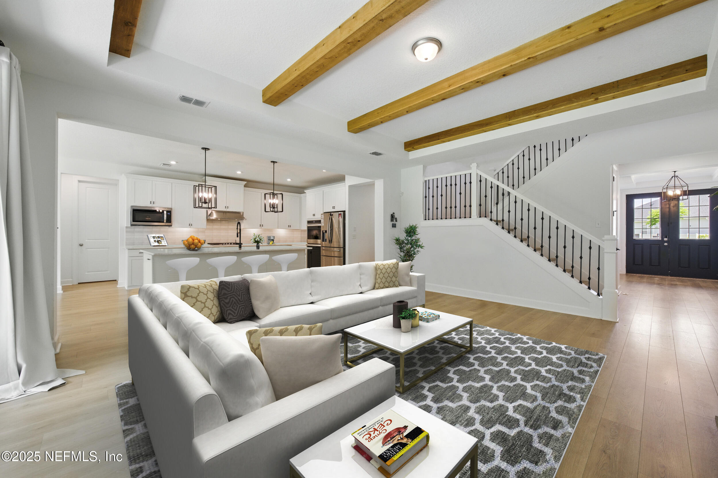 177 Windwalker Drive St. Augustine, FL 32092 - Photo 8 of 30 a living room with furniture and wooden floor