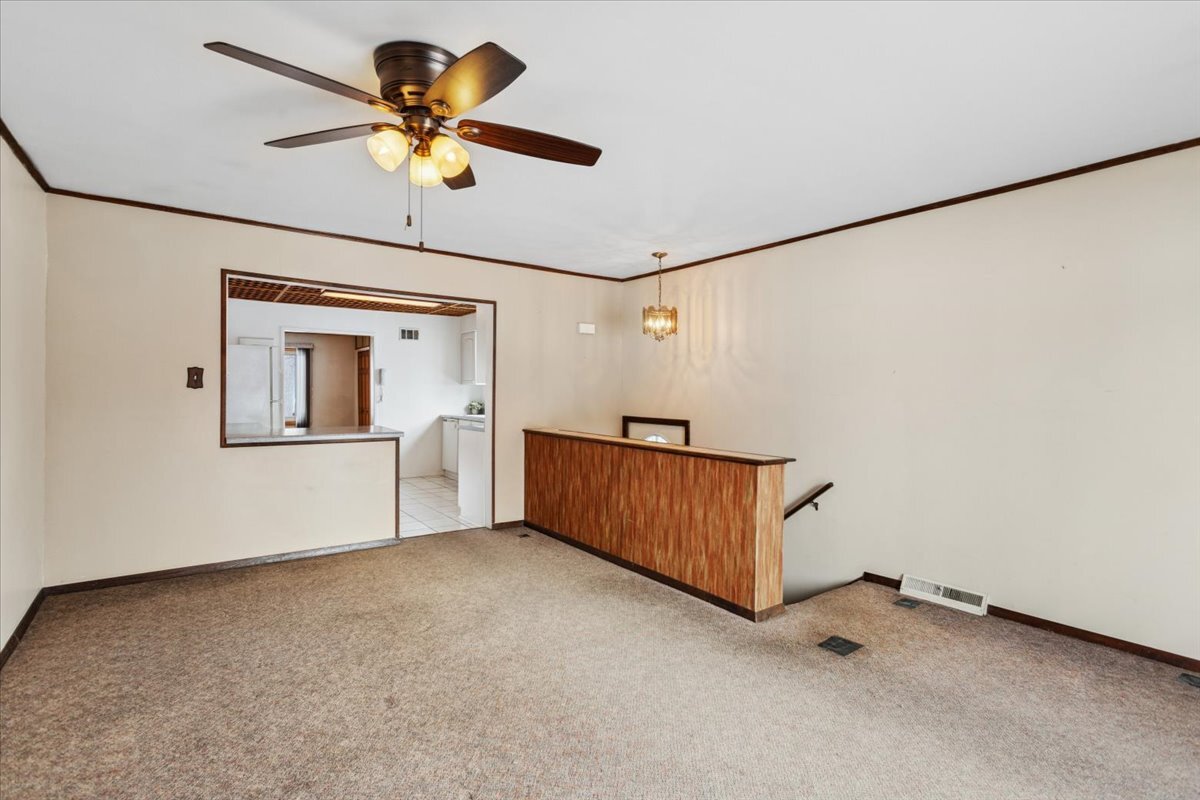 11333 72nd Street Burr Ridge, IL 60527 - Photo 8 of 32 a view of an empty room with a ceiling fan
