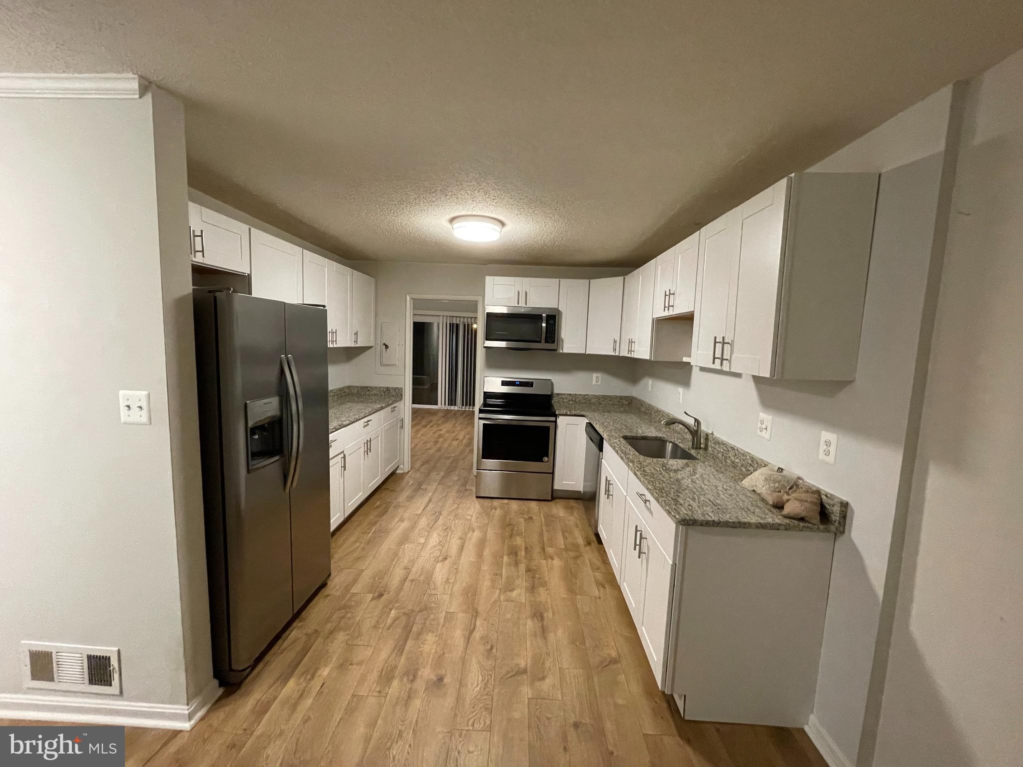 2314 Southgate Square Reston, VA 20191 - Photo 16 of 39 Open Galley Style Kitchen