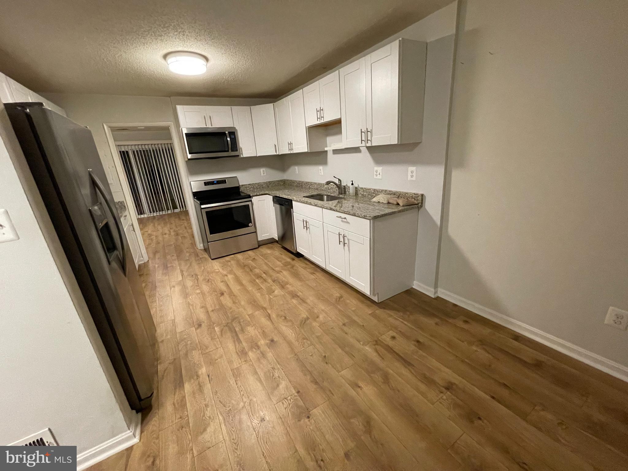 2314 Southgate Square Reston, VA 20191 - Photo 9 of 39 Kitchen Access To Living Area