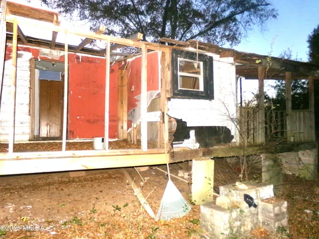a view of a house with a swimming pool