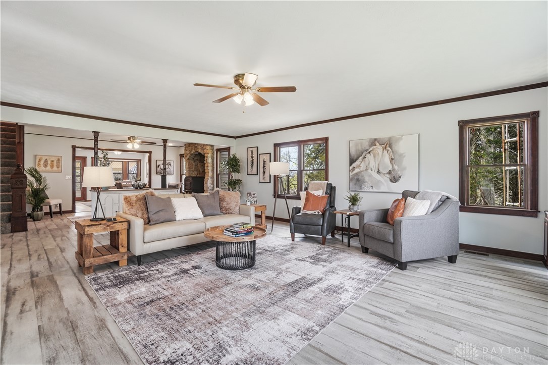 7553 Coffin Station Road Springfield, OH 45502 - Photo 28 of 95 Bright, open living space with light wood flooring and ample natural light.