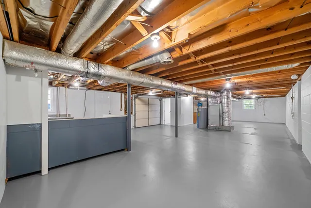 a view of a room with wooden walls