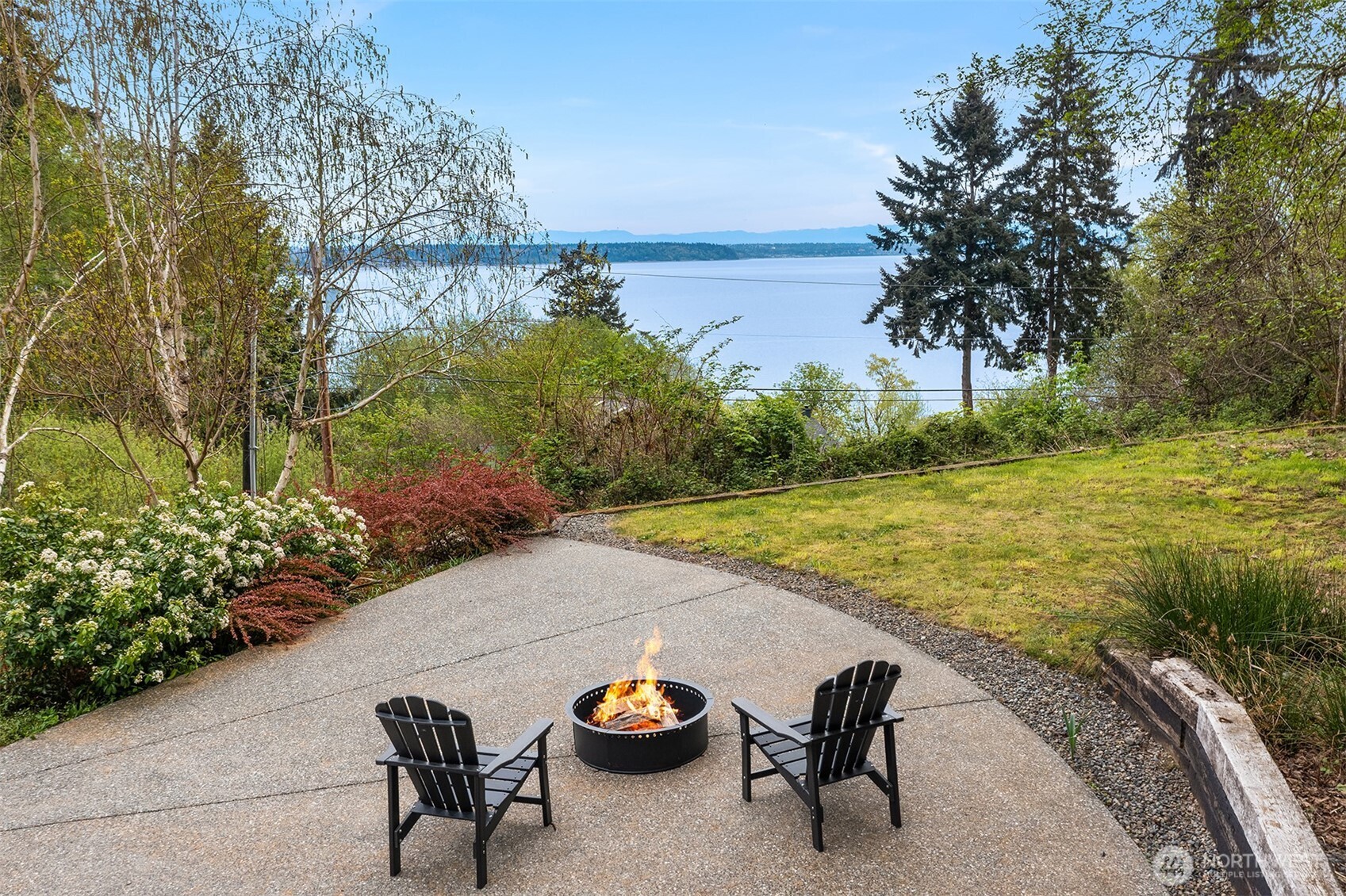 8302 Southwest Dilworth Road Vashon, WA 98070 - Photo 29 of 40 a view of a swimming pool with a yard and sitting area