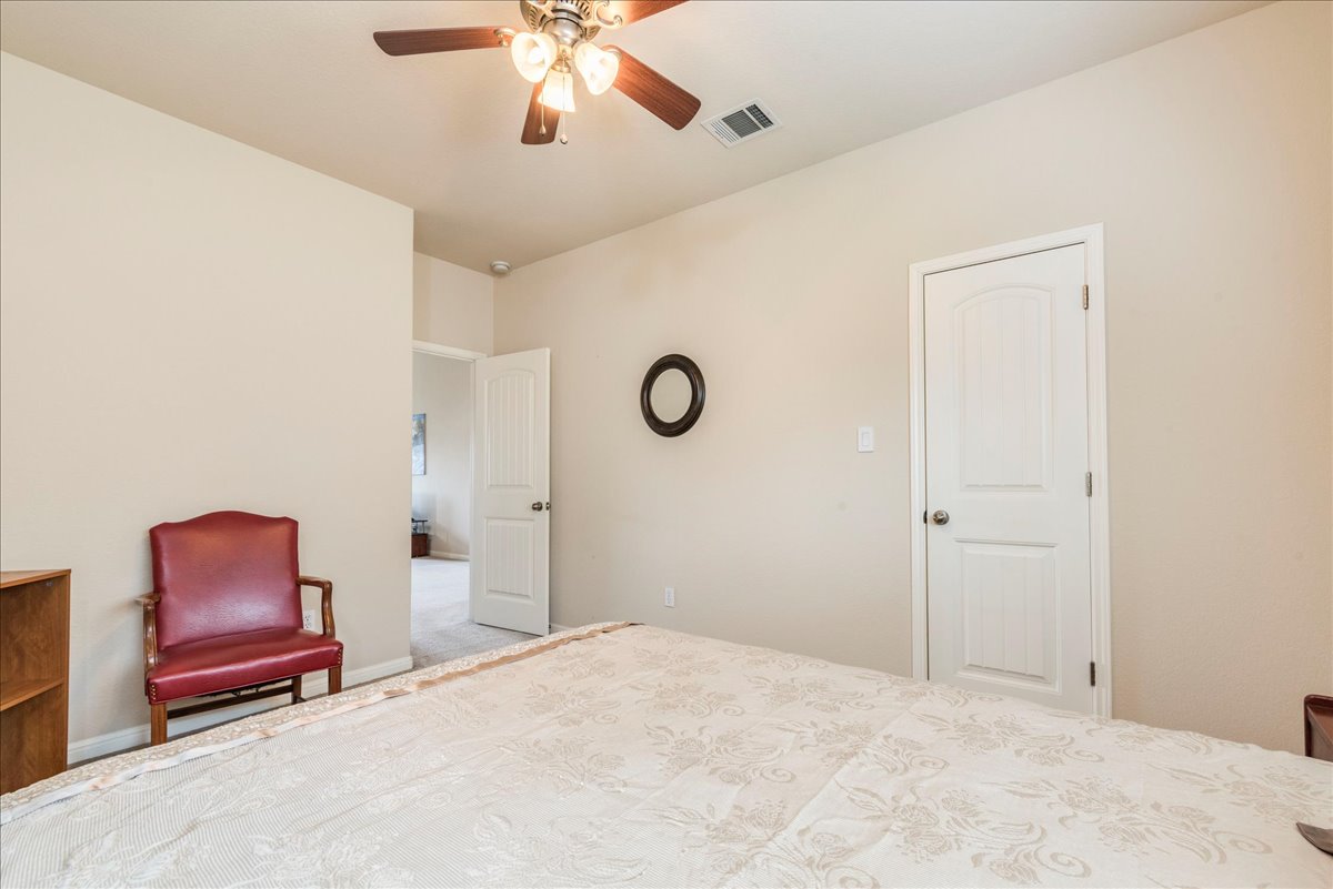 18628 Wind Valley Way Pflugerville, TX 78660 - Photo 19 of 33 a view of room with workspace and window