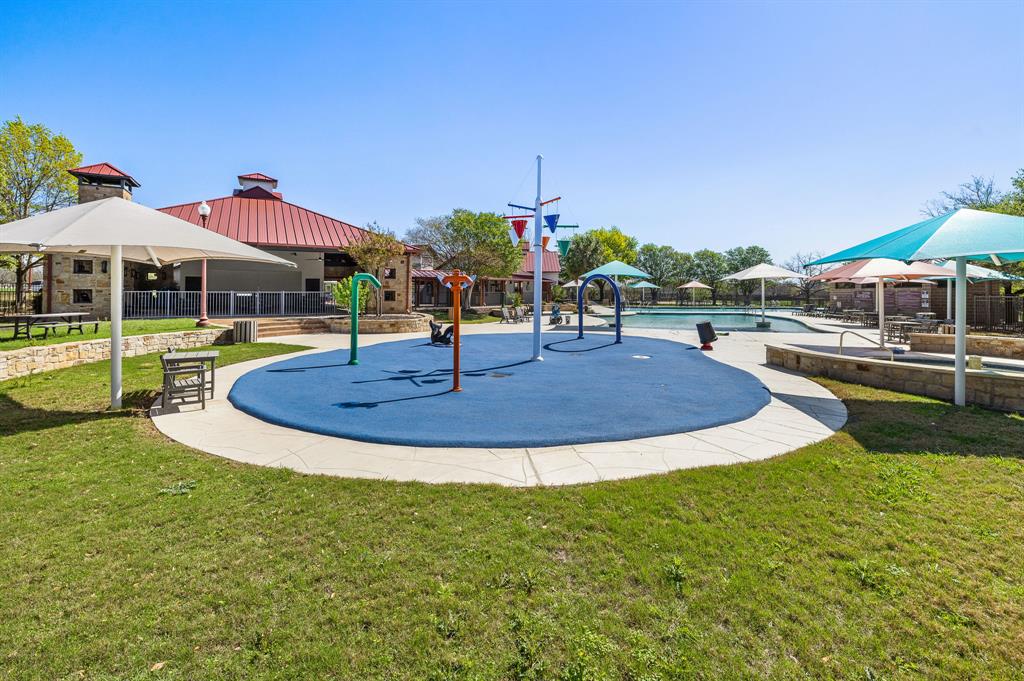 18628 Wind Valley Way Pflugerville, TX 78660 - Photo 30 of 33 a view of a backyard with a patio