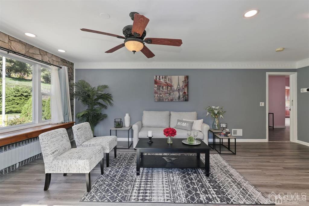 327 Valley Road Clifton, NJ 07013 - Photo 5 of 32 a living room with furniture and wooden floor