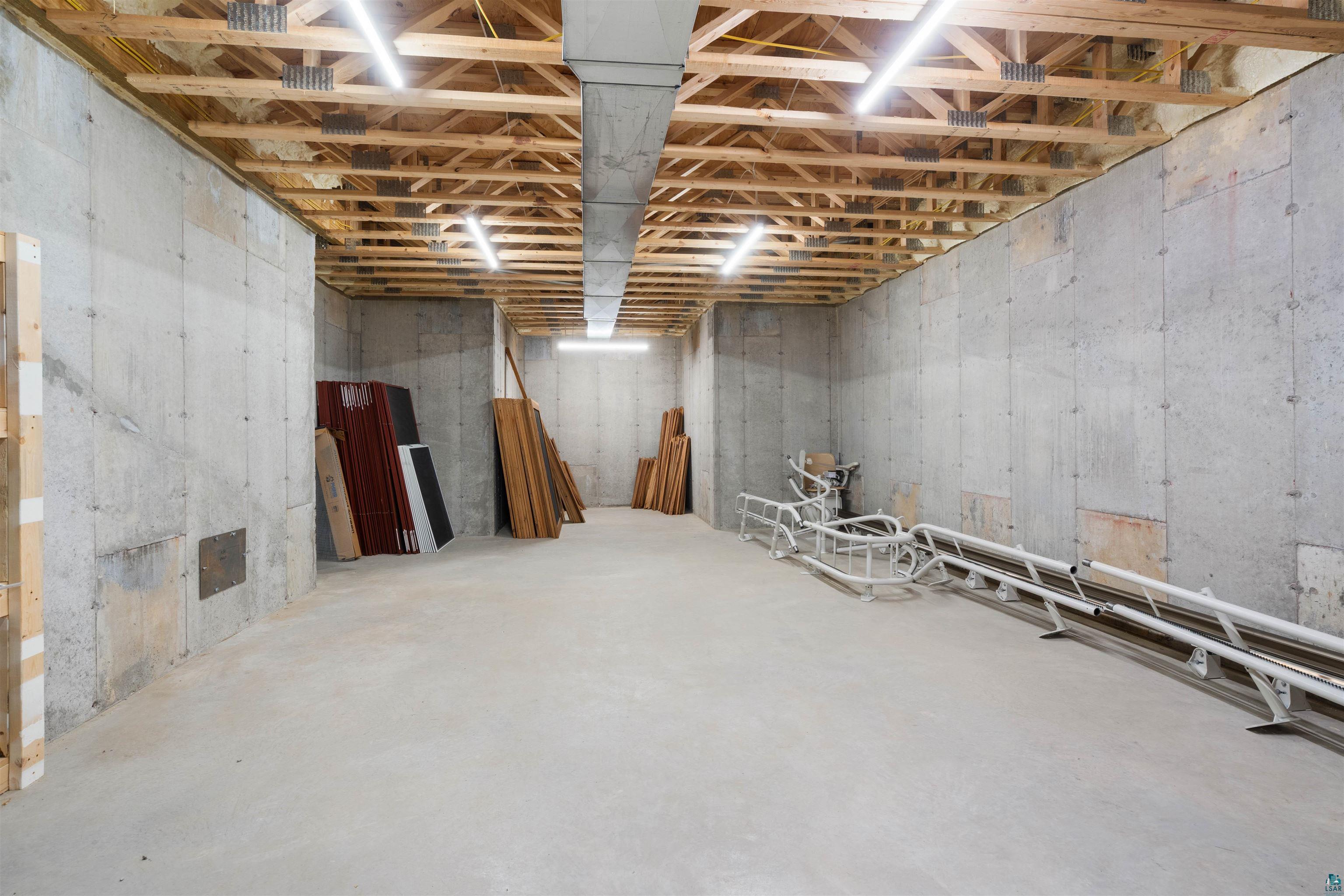 31235 Birch Grove Road Washburn, WI 54891 - Photo 67 of 90 Expansive Lower Level Storage Area