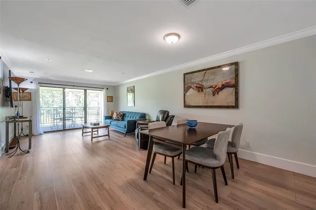 a bedroom with a bed and a tv on table