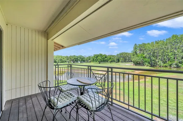 a bathroom with a shower sink vanity and mirror