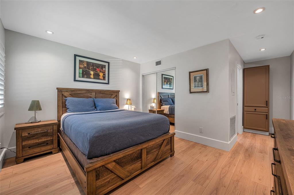 29147 Bay Hollow Drive, Unit 3224 Wesley Chapel, FL 33543 - Photo 40 of 89 a bedroom with bed and wooden floor