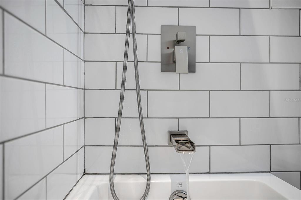 29147 Bay Hollow Drive, Unit 3224 Wesley Chapel, FL 33543 - Photo 47 of 89 a bathroom with a shower