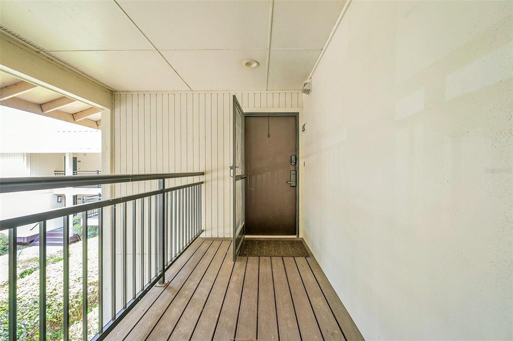 29147 Bay Hollow Drive, Unit 3224 Wesley Chapel, FL 33543 - Photo 6 of 89 a view of a hallway with wooden floor