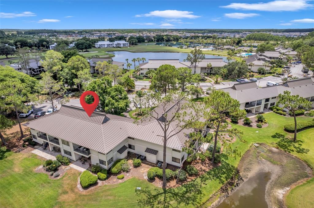 29147 Bay Hollow Drive, Unit 3224 Wesley Chapel, FL 33543 - Photo 76 of 89 an aerial view of a residential houses with outdoor space and swimming pool