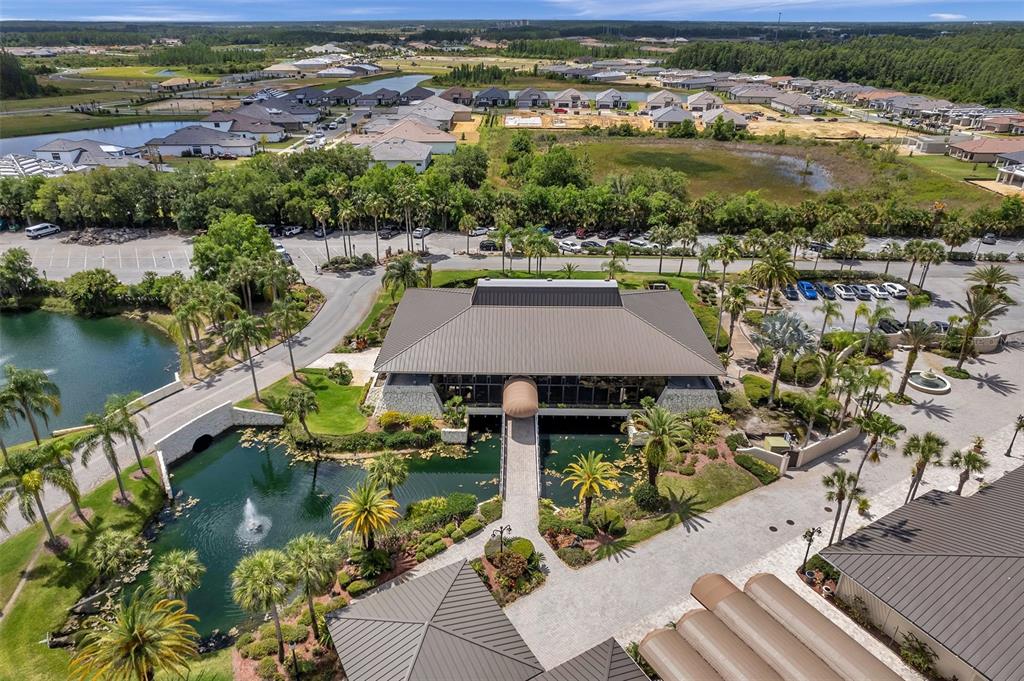 29147 Bay Hollow Drive, Unit 3224 Wesley Chapel, FL 33543 - Photo 88 of 89 an aerial view of residential houses with outdoor space and river