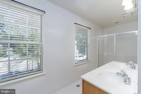 a bathroom with a sink and a bathtub