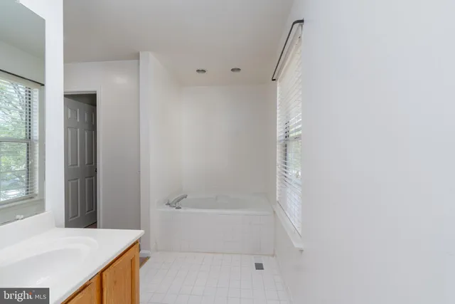 a bathroom with a bathtub