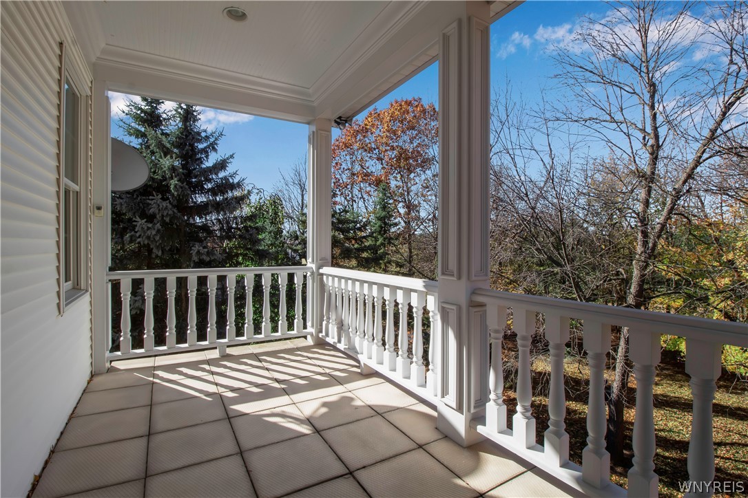 9590 Cobblestone Drive Clarence, NY 14031 - Photo 19 of 42 Private porch off the primary bedroom