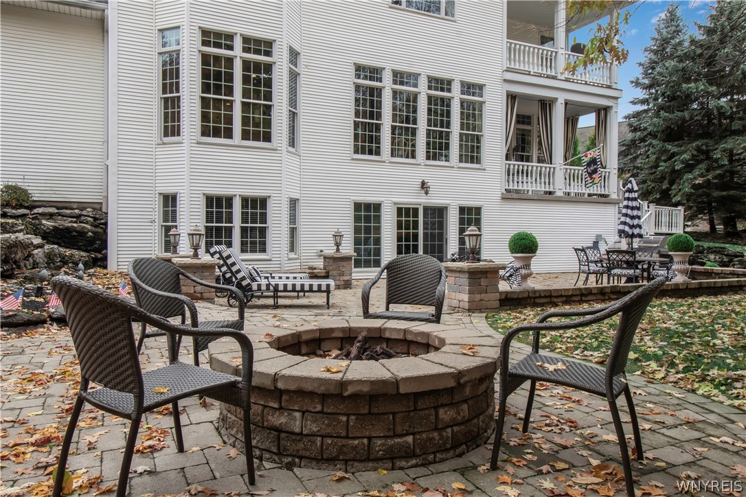 9590 Cobblestone Drive Clarence, NY 14031 - Photo 35 of 42 Fit pit in backyard, gas starter