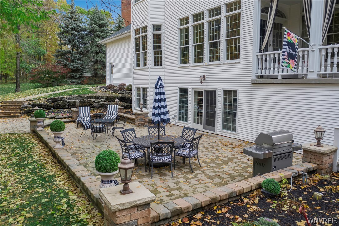 9590 Cobblestone Drive Clarence, NY 14031 - Photo 36 of 42 Back patio