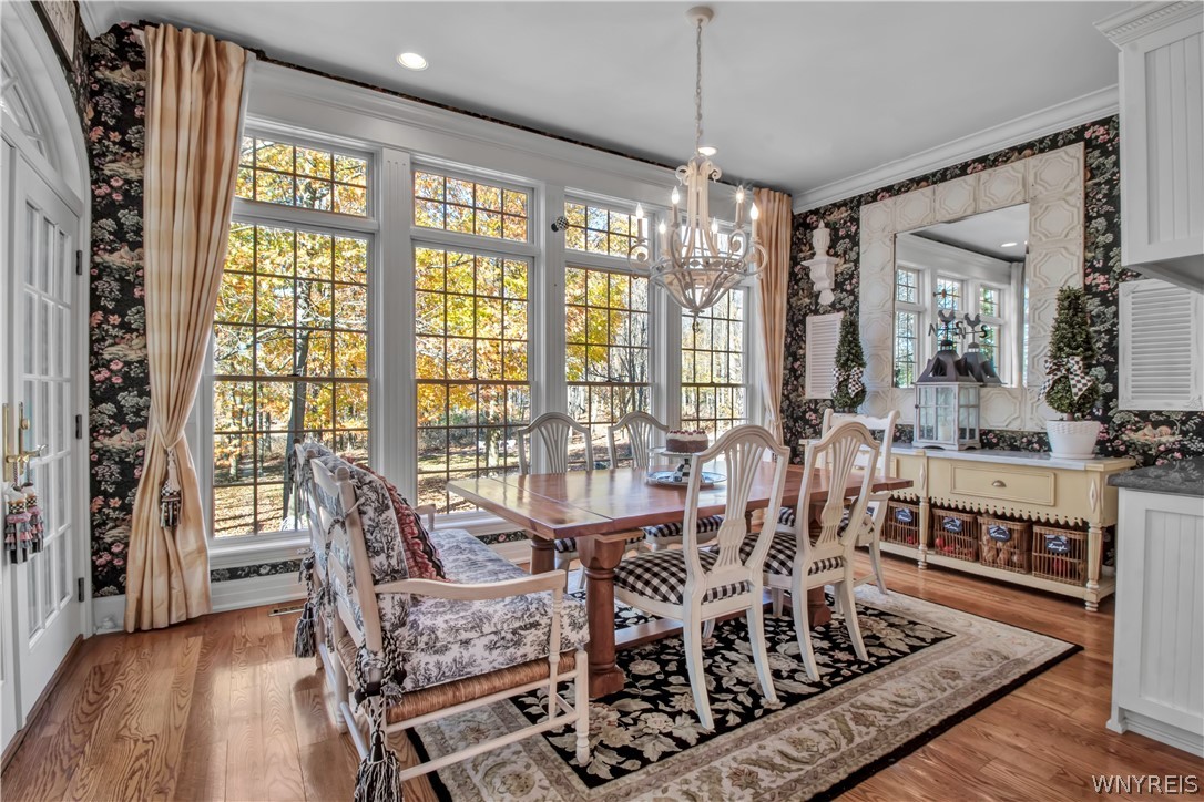 9590 Cobblestone Drive Clarence, NY 14031 - Photo 8 of 42 Eating area overlooking back yard