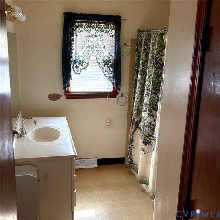 85 Frenchs Store Road Cumberland, VA 23040 - Photo 13 of 19 Bathroom featuring a vanity with an integrated sin