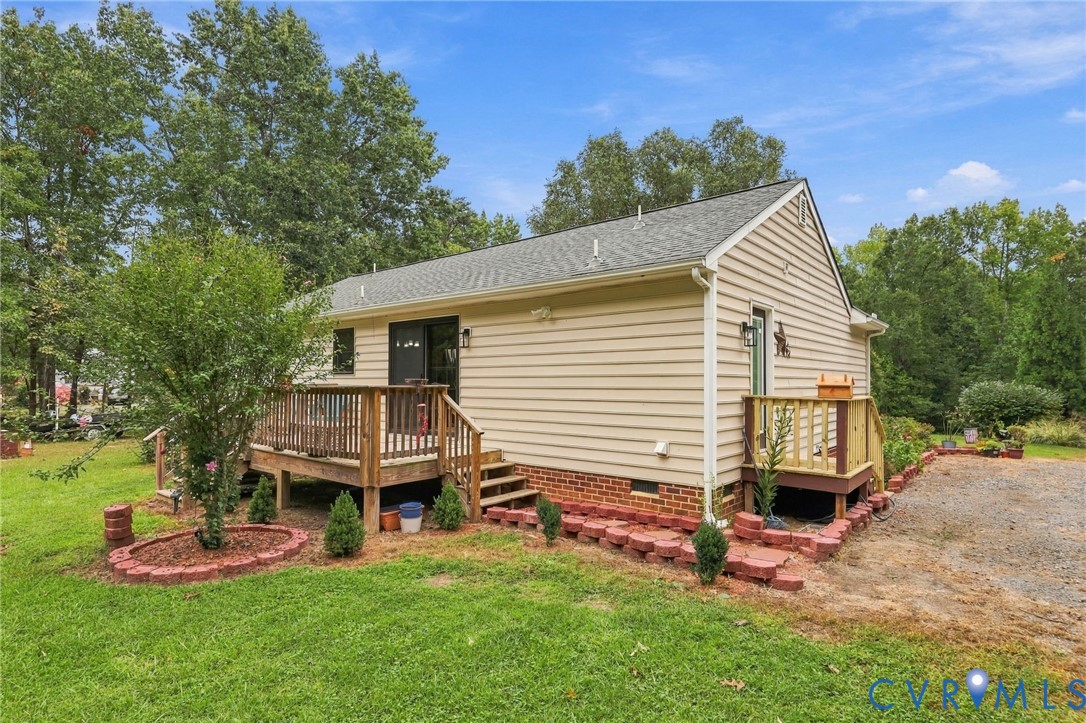 133 Ford Road Bumpass, VA 23024 - Photo 51 of 55 Exterior siding, wood deck, brick foundation, grav