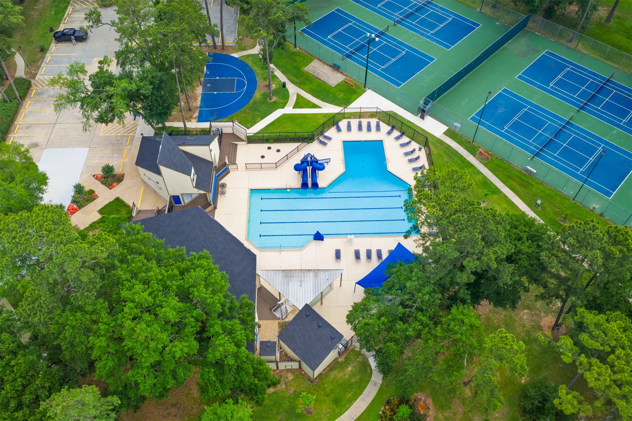20214 Woodsboro Court Spring, TX 77388 - Photo 41 of 50 Oaks of Devonshire features a 5-Acre Community Park with Jr. Olympic Pool, 2 Water Slides, Clubhouse/Party Rm, 2 Tennis/Pickle Ball Cts, Pavilion, Basketball Ct, 2 Playgrounds, Soccer Field & Baseball Field, and Walking Trails!