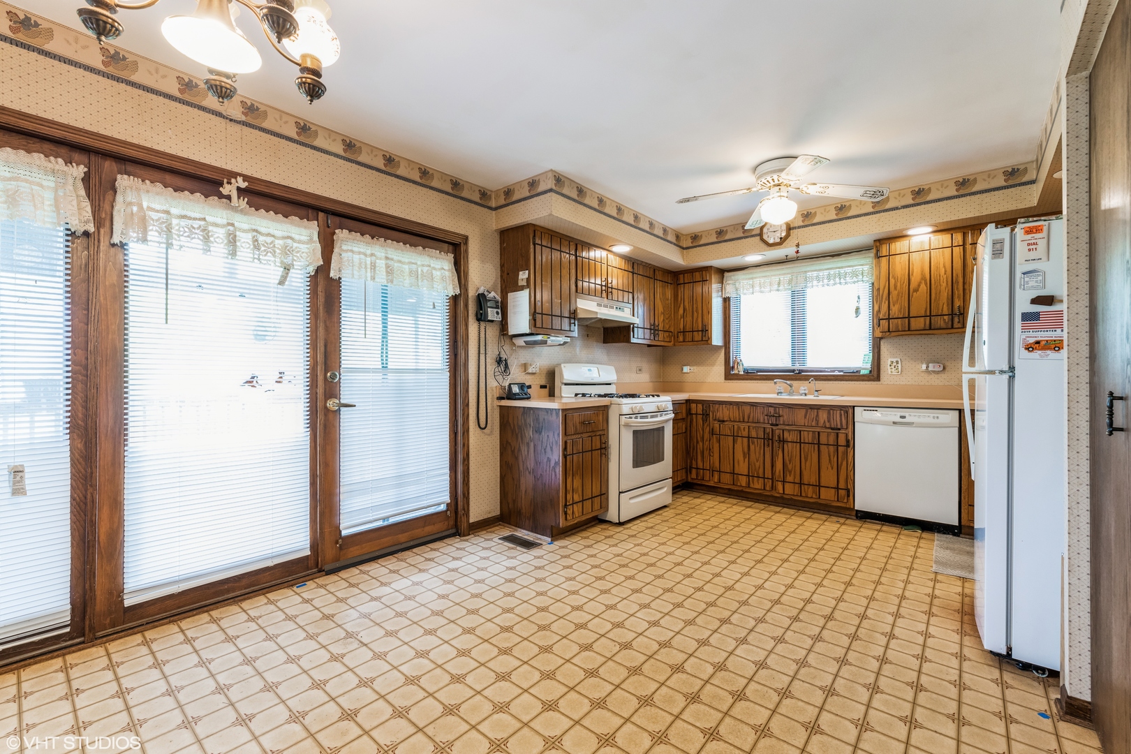 7305 West Pauling Road Monee, IL 60449 - Photo 16 of 27 a kitchen with stainless steel appliances a sink a counter top space cabinets and stainless steel appliances