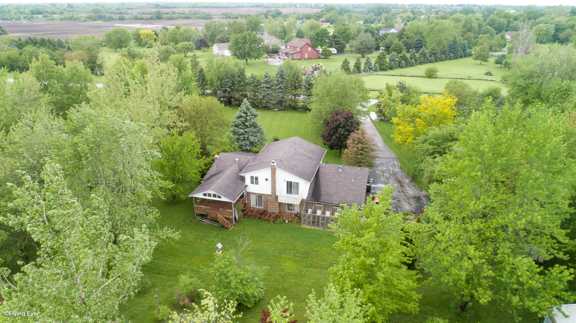7305 West Pauling Road Monee, IL 60449 - Photo 5 of 27 an aerial view of a house with pool outdoor seating and yard