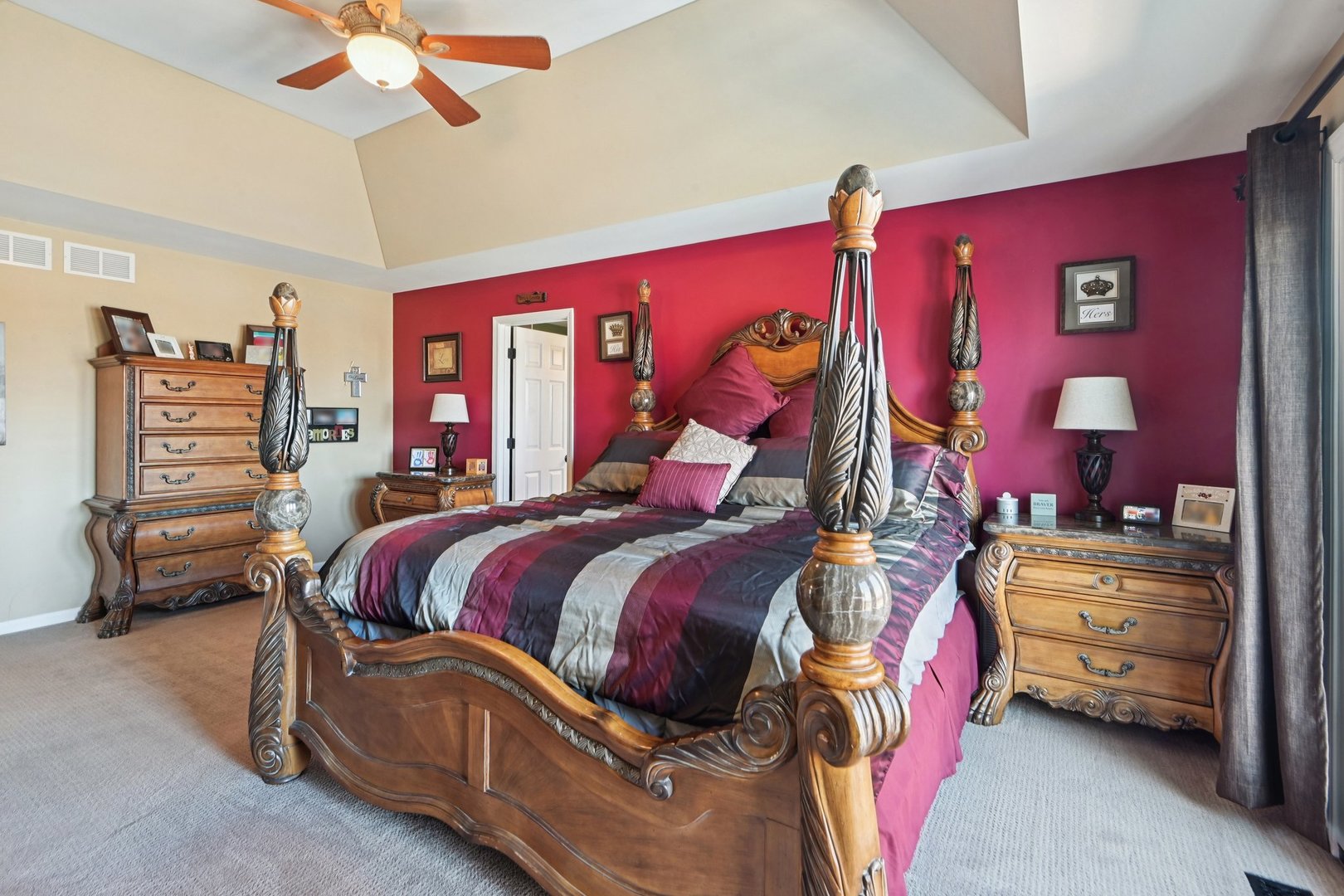 16385 Celtic Circle Manhattan, IL 60442 - Photo 27 of 49 a bedroom with a bed and a chandelier