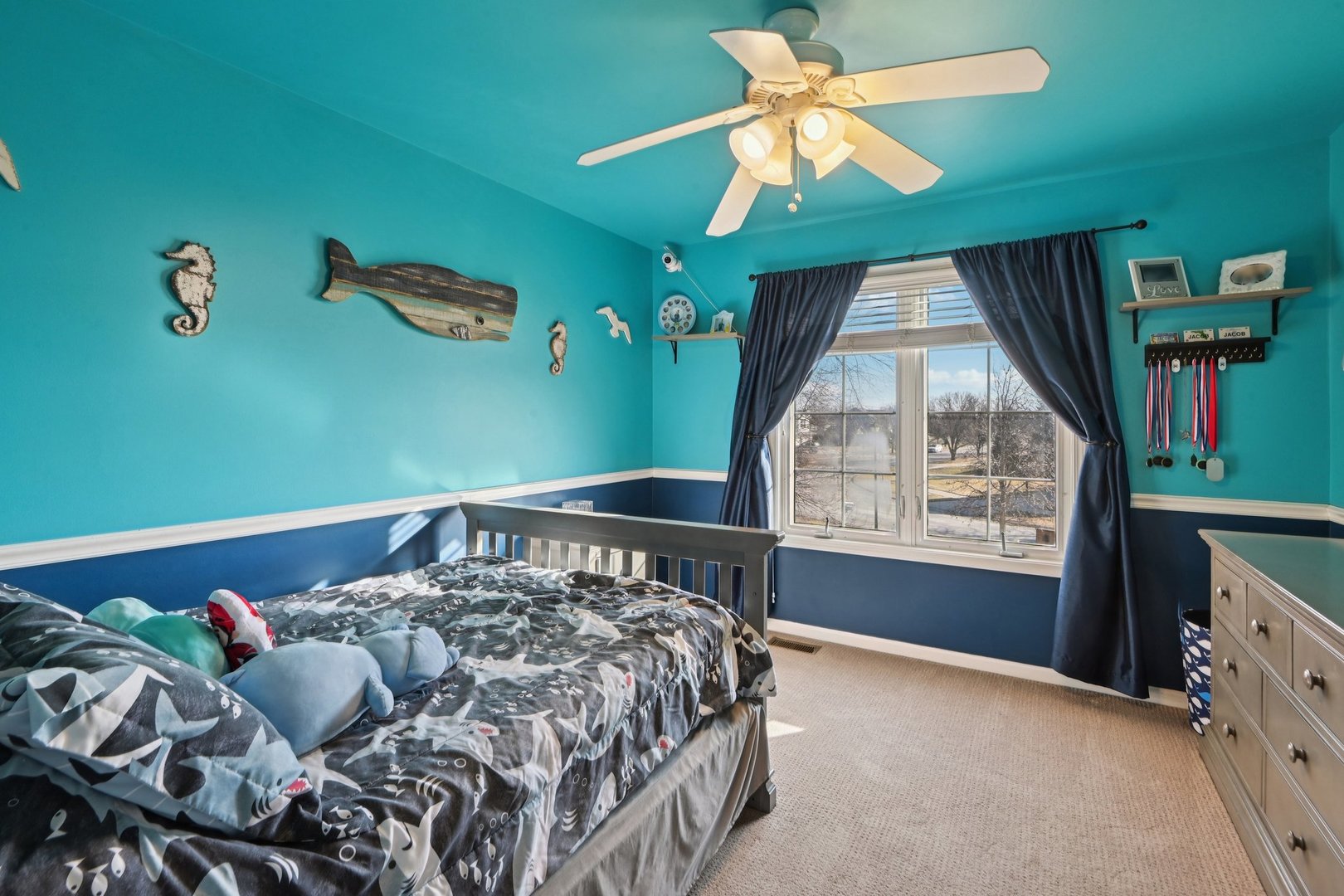 16385 Celtic Circle Manhattan, IL 60442 - Photo 31 of 49 a bed sitting in a bedroom next to a window